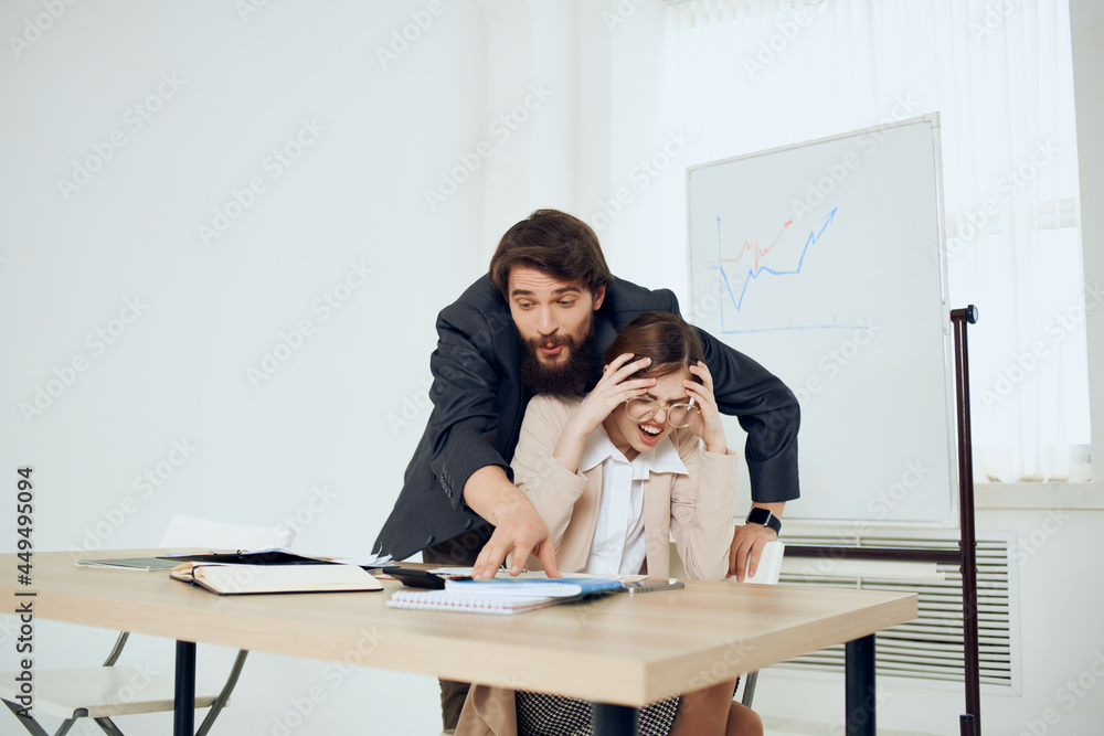 Fototapeta premium man harassing secretary at work harassment boss work problem