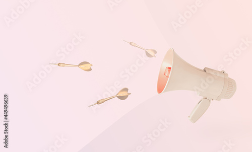 Golden arrows and beige megaphone on pastel pink and beige background with copy space. Minimal, abstract, creative scene. Free, public, political, or hate speech, fake news, or hurtful words concept. photo