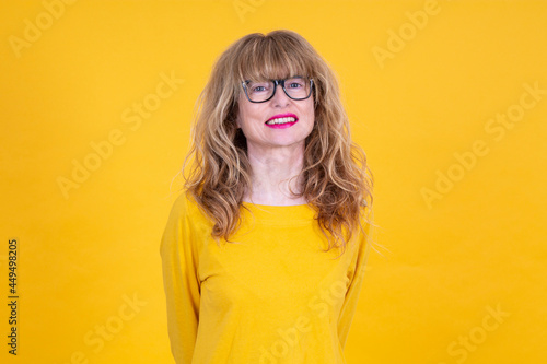 portrait of middle aged woman with glasses isolated © tetxu