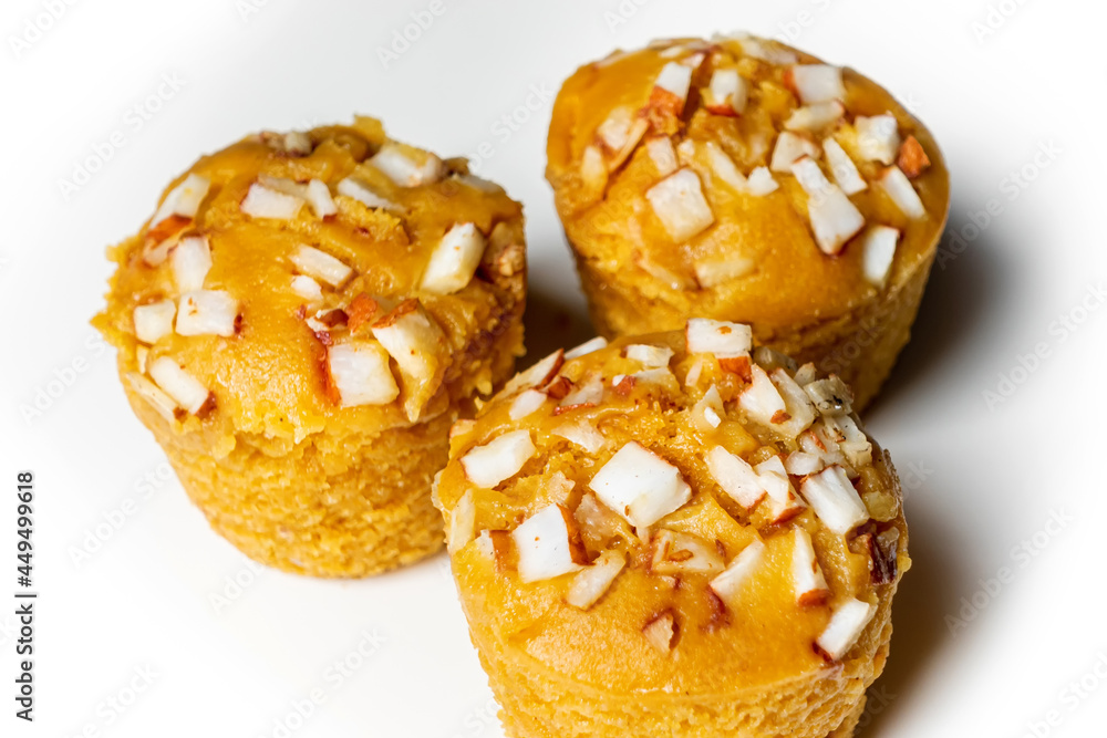 3 pieces popular and yummy traditional cake made with raw ripe palmyra palm fruit juice. Steamed palmyra palm cake in isolated white background. 3 pieces popular and yummy traditional cake made with raw ripe palmyra palm fruit juice. Steamed palmyra palm cake in isolated white background.