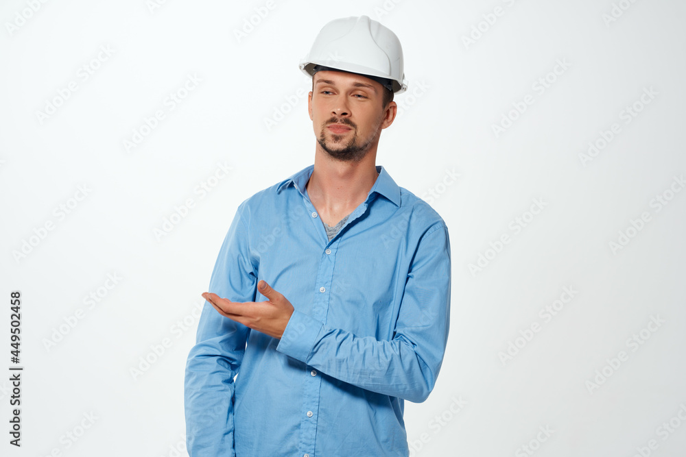 man in blue shirt white construction helmet protection professional engineer man in blue shirt white construction helmet protection professional engineer