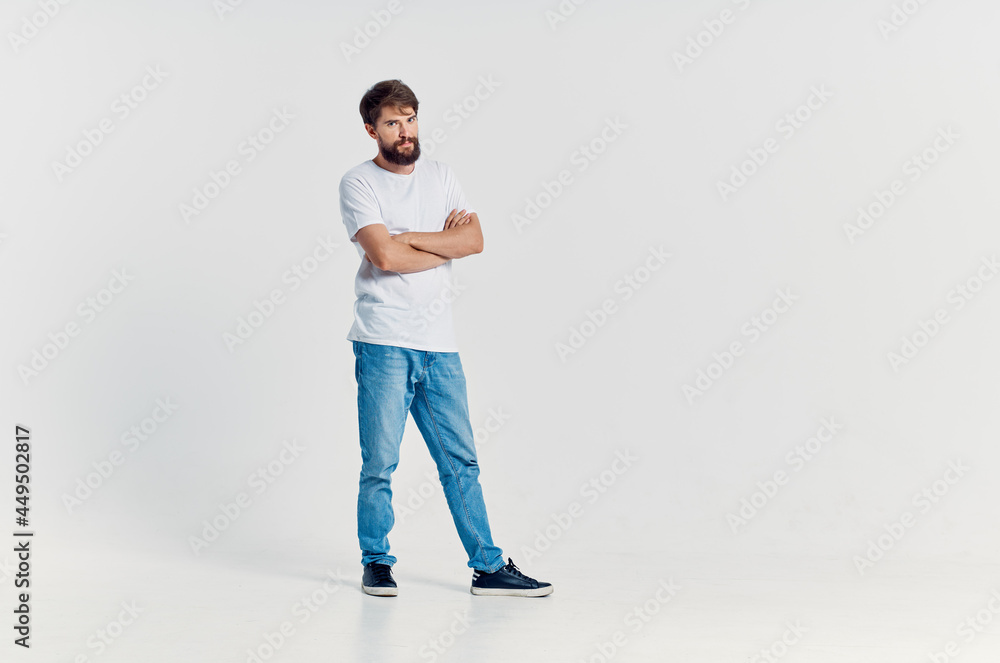 man in white t-shirt emotions posing fun Studio man in white t-shirt emotions posing fun Studio
