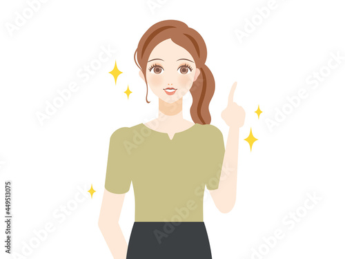 指を指す私服女性