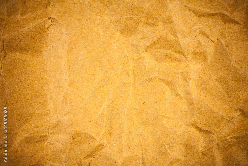 Fototapeta premium Crumpled brown paper texture.