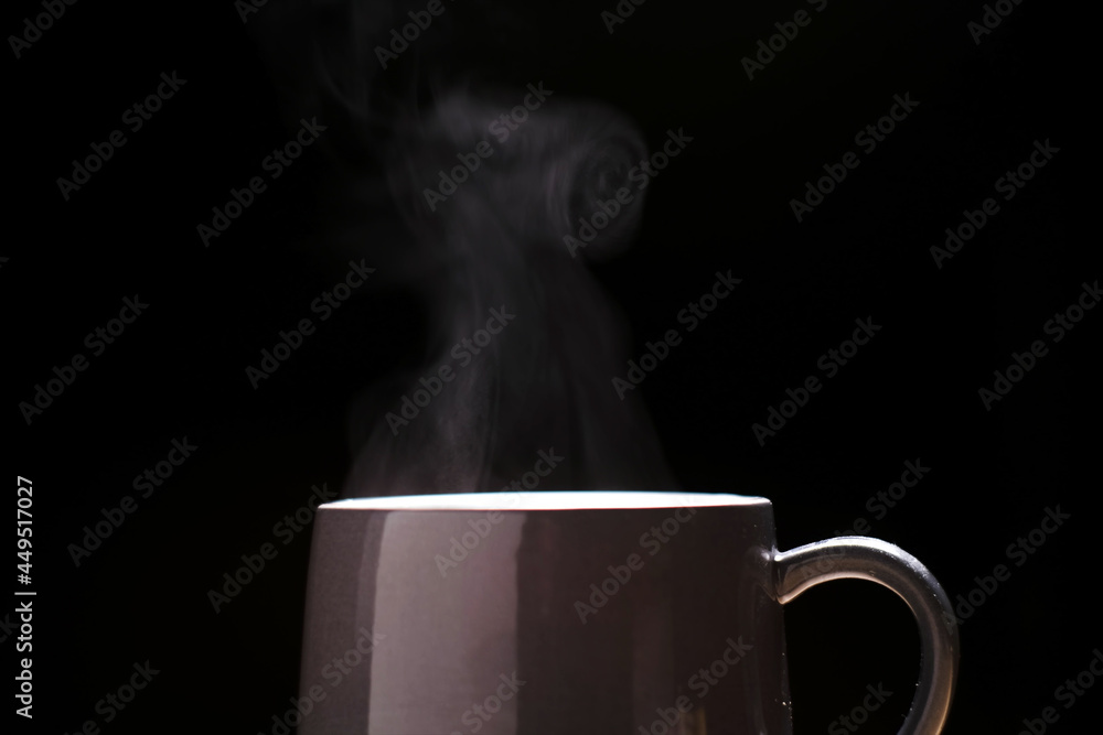 Close up Cup of coffee, coffee with smoke isolated on black background. Close up Cup of coffee, coffee with smoke isolated on black background.