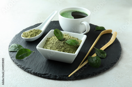 Concept of japanese tea with matcha on white textured table