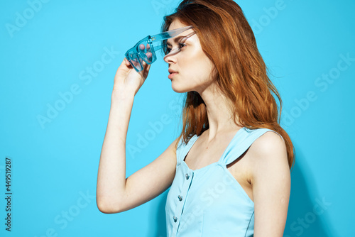woman in a dress and glasses posing Studio fun model