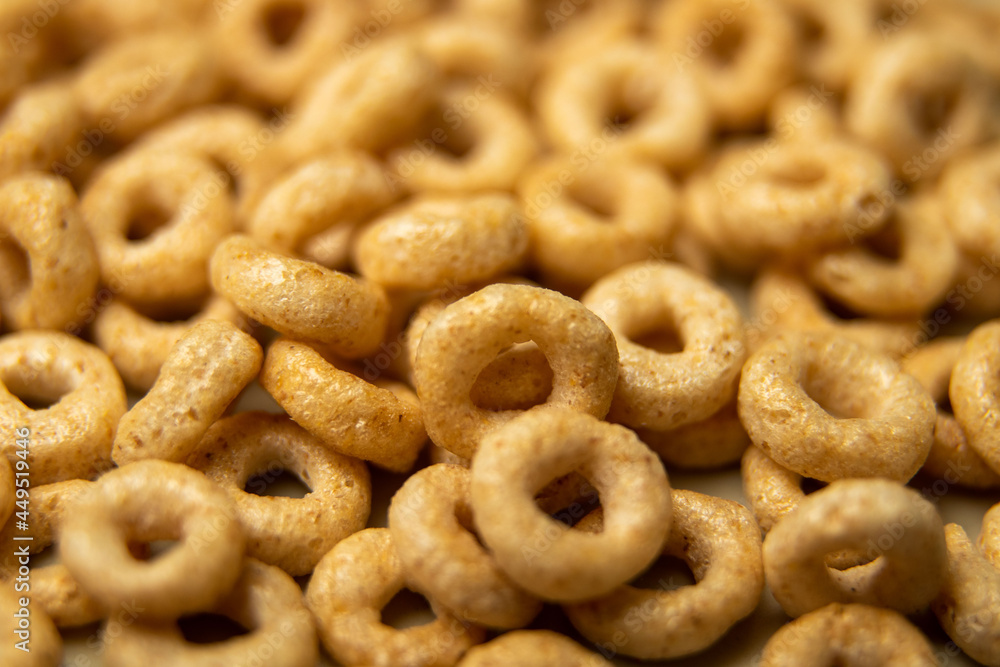 closeup cheerios oat cereal in large pile, background, delicious breakfast closeup cheerios oat cereal in large pile, background, delicious breakfast