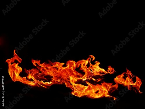 Blaze fire flame texture for banner background © sainan