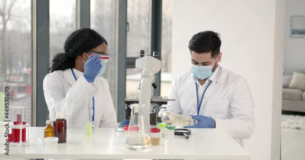 Researchers creating vaccine for covid-19 in a lab Researchers creating vaccine for covid-19 in a lab