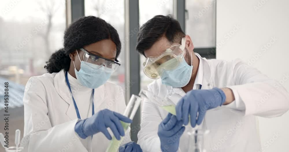 Researchers creating vaccine for covid-19 in a lab Researchers creating vaccine for covid-19 in a lab