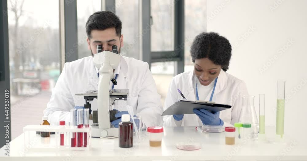 Researchers creating vaccine for covid-19 in a lab Researchers creating vaccine for covid-19 in a lab