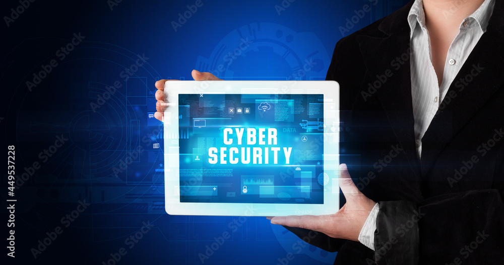 Person holding tablet, security concept Person holding tablet, security concept