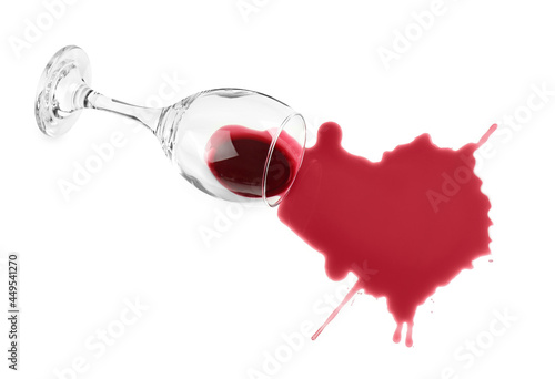 Overturned glass and spilled wine on white background, top view © New Africa
