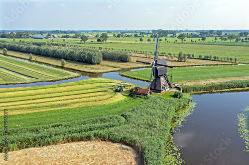 Aerial from Oudendijkste Windmill in a dutch landscape in the Netherlands photo