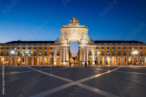 Lisbon, Portugal - July 16, 2021: View of the Commerce Square (Praca do Comercio) and the Rua Augusta triumphal arch, in the city of Lisbon, Portugal, at dusk.