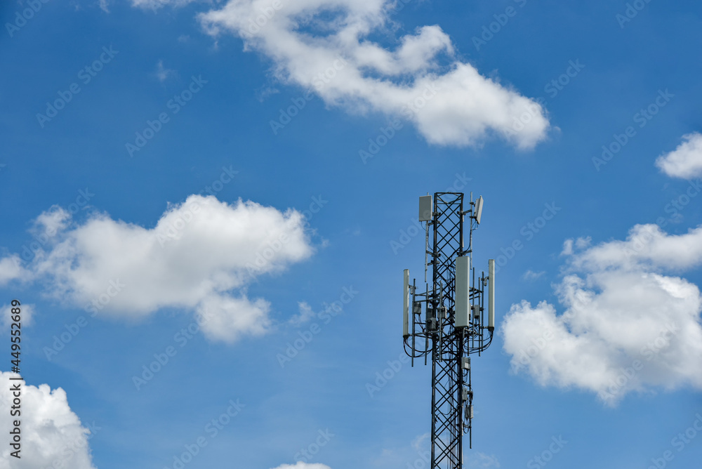 Telecommunication towers with motions clouds on blue sky background. Telecommunication towers with motions clouds on blue sky background.