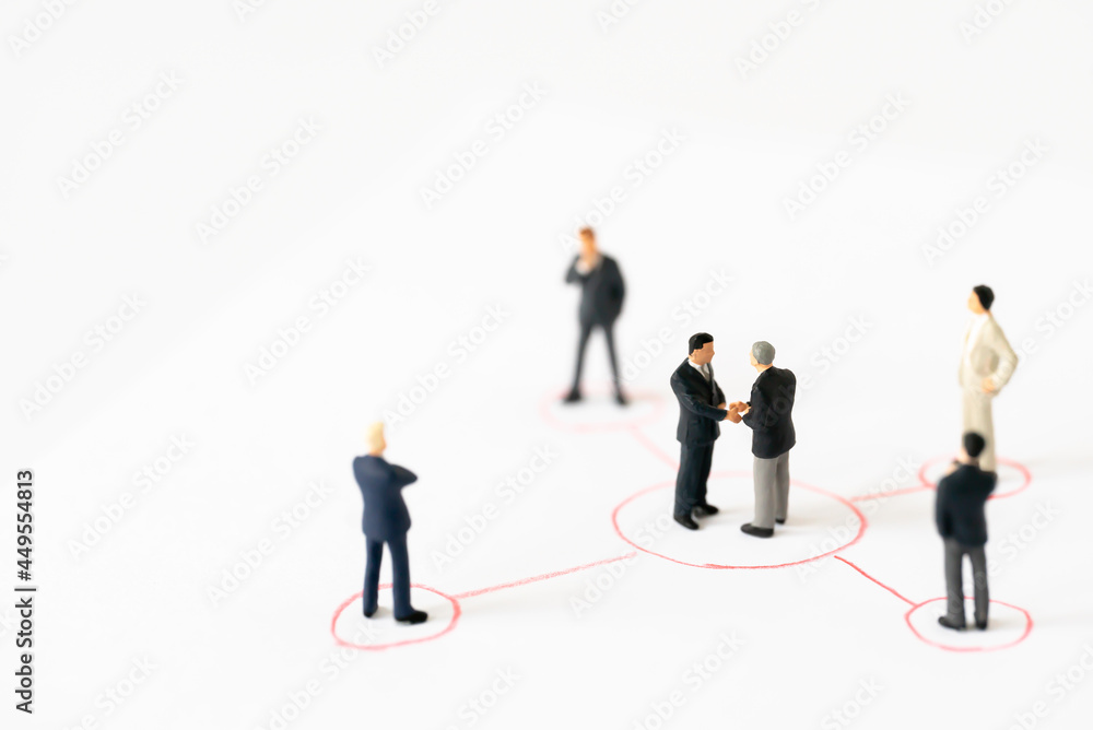 Miniature businessman shake hand partner client customers on organization sign with success dealing business using as contract commitment agreement investment and partnership business development join Miniature businessman shake hand partner client customers on organization sign with success dealing business using as contract commitment agreement investment and partnership business development join