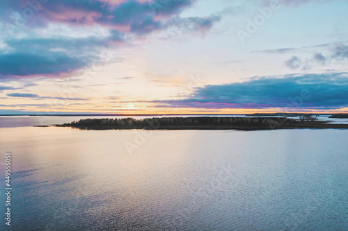 The Clouds over the lake panorama aerial. Evening landscape aerial. Aerial panorama. Clouds on the river in the evening.