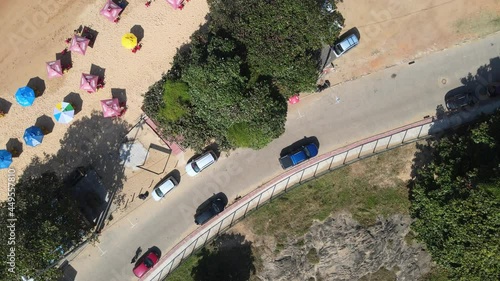 Visão aérea da praia de Setiba, na reginão norte de guarapari, mostando um dia ensolarado com barraquinhas e uma praia tropical deserta. Turismo no Espírito Santo. photo