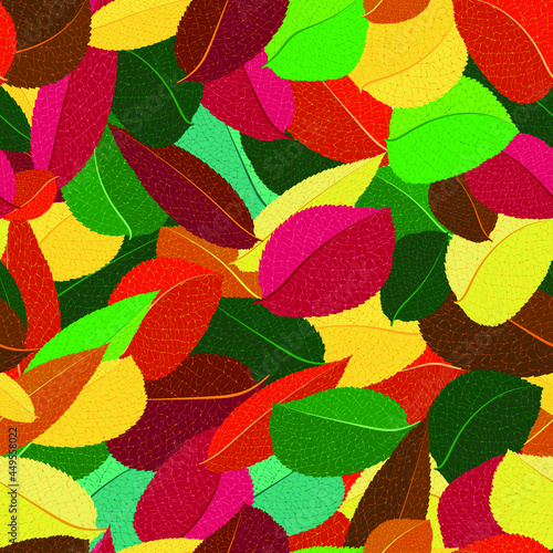 bright background  endless texture of autumn leaves of different colors  randomly arranged