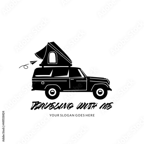 vehicle with roof top and paper plane photo