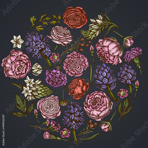 Round floral design on dark background with peony, carnation, ranunculus, wax flower, ornithogalum, hyacinth