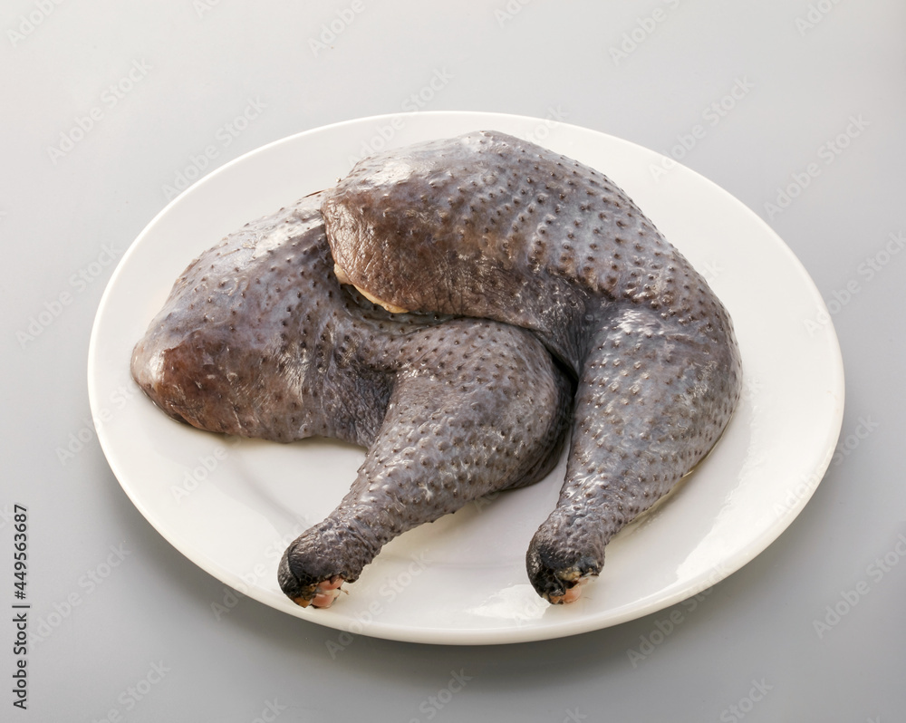 Obraz premium Fresh ingredients, closeup fresh black chicken leg