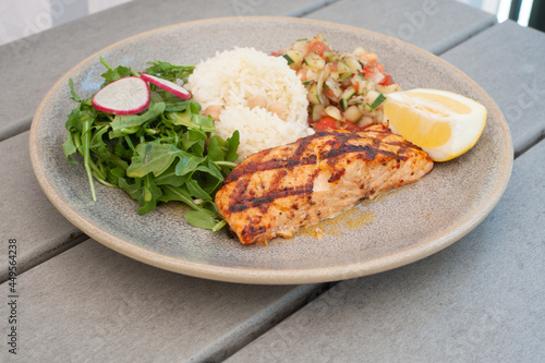Grilled salmon with salad and rice