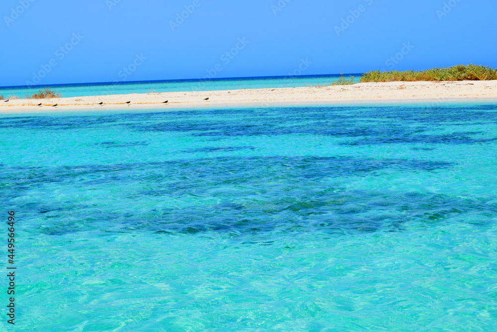 island umluj beach with water 
