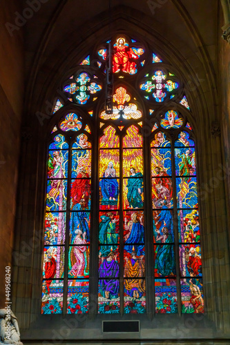 Multicolored stained glass windows in the Catholic Cathedral of St. Vitus in Prague