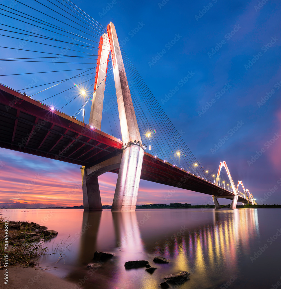 Naklejka premium The Nhat Tan Bridge is a cable-stayed bridge crossing the Red River in Hanoi,