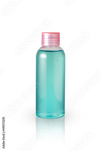 A plastic bottle containing alcohol for cleaning.
