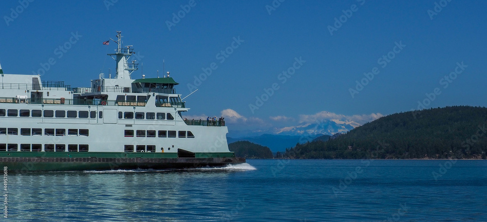 Washington State Ferry underway in the San Juan Islands with Mount Baker in the background. Washington State Ferry underway in the San Juan Islands with Mount Baker in the background.