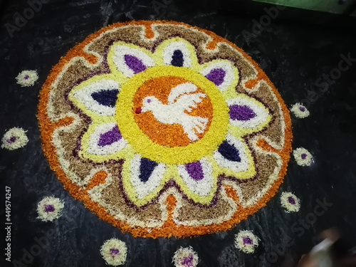 The art of flowers (Pookalam) made for Onam, the famous folk festival of Kerala. photo