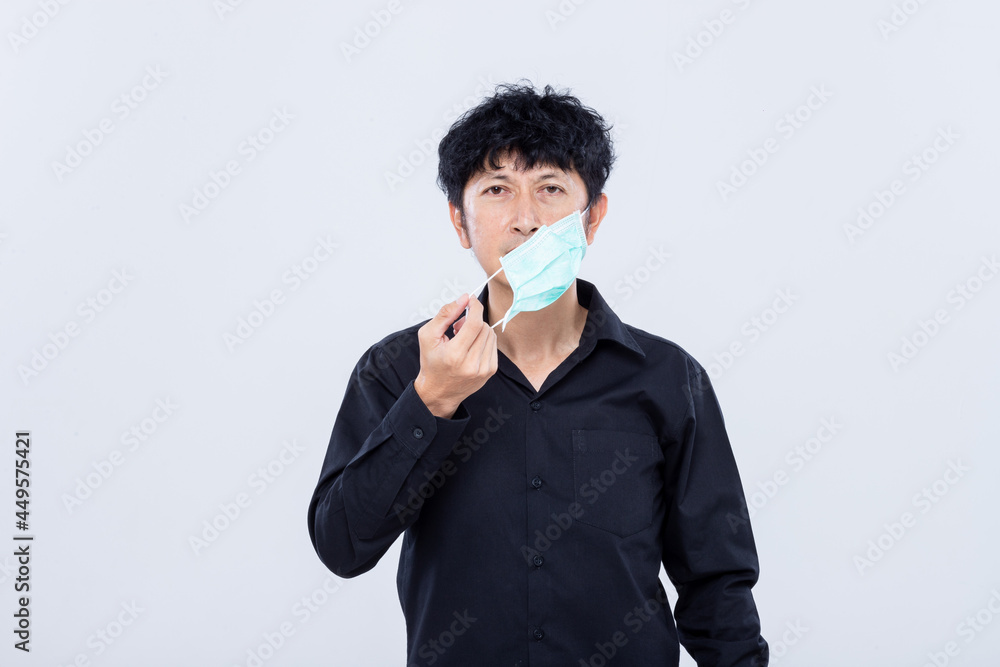 Asian men wear masks to prevent PM.5 dust and The coronavirus epidemic is spreading isolated white background. Asian men wear masks to prevent PM.5 dust and The coronavirus epidemic is spreading isolated white background.