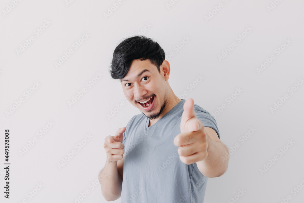 Smile and happy Asian man is proud to present and offer for an advertisement. Smile and happy Asian man is proud to present and offer for an advertisement.