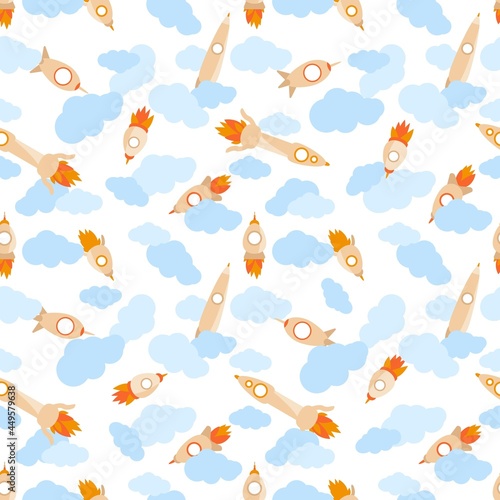 Seamless vector pattern with toy rockets in the clouds. Cute childish print on a white background.