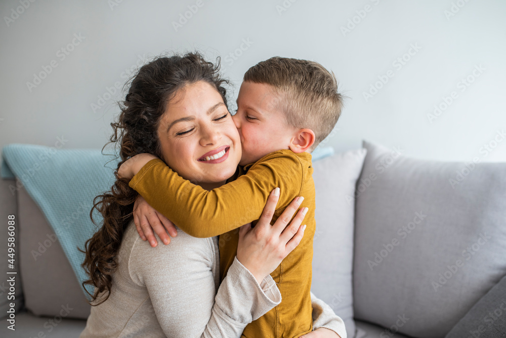 The kind of love that can't be described, only felt. Mom and son. Happy mother's day! Mother hugging her child. The kind of love that can't be described, only felt. Mom and son. Happy mother's day! Mother hugging her child.