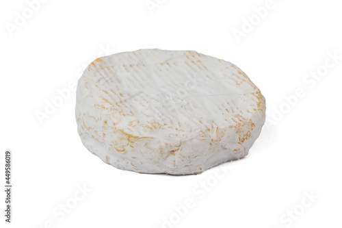 A piece of fresh camembert cheese isolated on a white background.