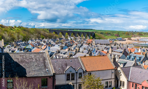 A view across the roof tops towards the viaduct at the town of Cullen, Scotland on a summers day