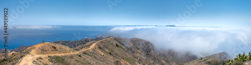 Clouds hug the windward side of Catalina Island along the ridge line of the Trans Catalina Trail