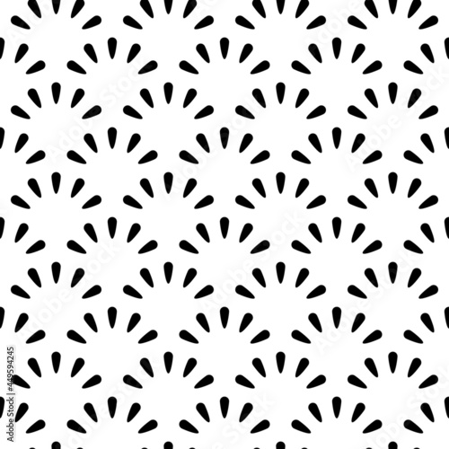 Black and white abstract geometric seamless pattern. Scales or circles of little drops. Fans, flowers, drops, circles background