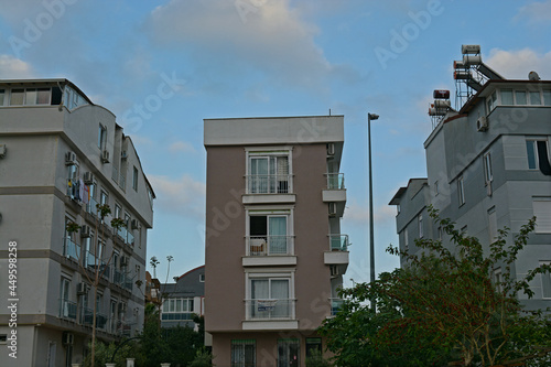row of brown and white buildings © Alp Guvenc