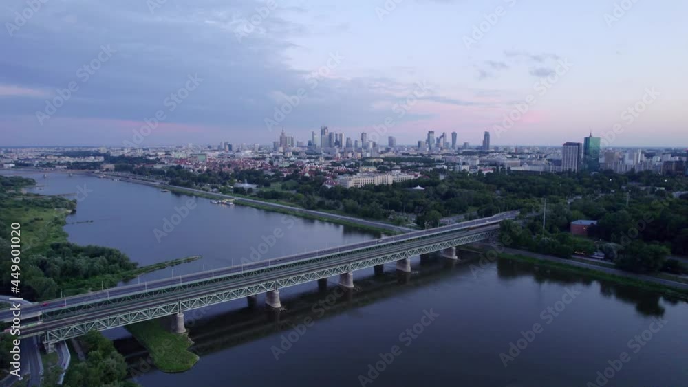 Warsaw at sunset. The capital of Poland is illuminated by a beautiful orange sun. Warsaw at sunset. The capital of Poland is illuminated by a beautiful orange sun.