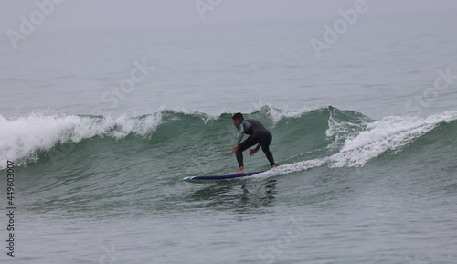 Canvas Print surfing the waves