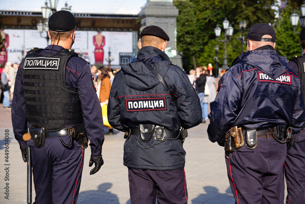 Moscow, Russia - August 29, 2020. Three police officers on duty. Moscow police officers patrol the city streets Moscow, Russia - August 29, 2020. Three police officers on duty. Moscow police officers patrol the city streets