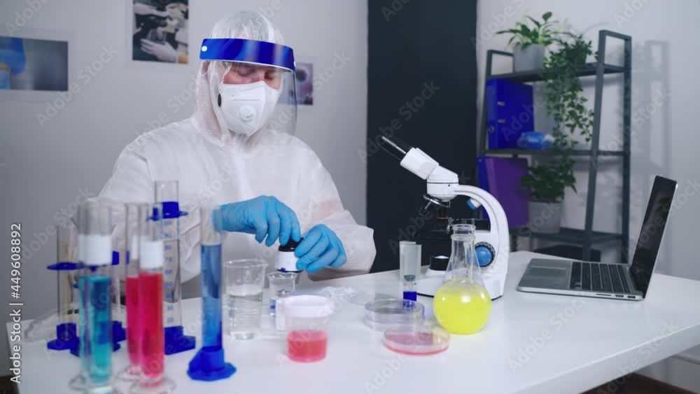 Chemist doing research in laboratory Chemist doing research in laboratory