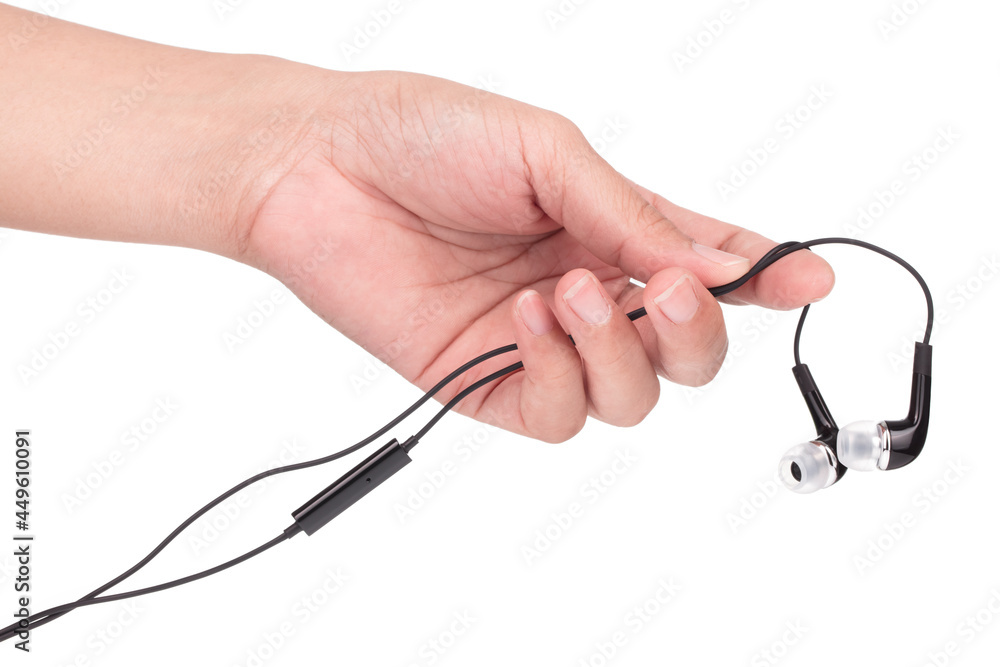 Hand holding In ear headphone bluetooth wireless isolated on white background Hand holding In ear headphone bluetooth wireless isolated on white background