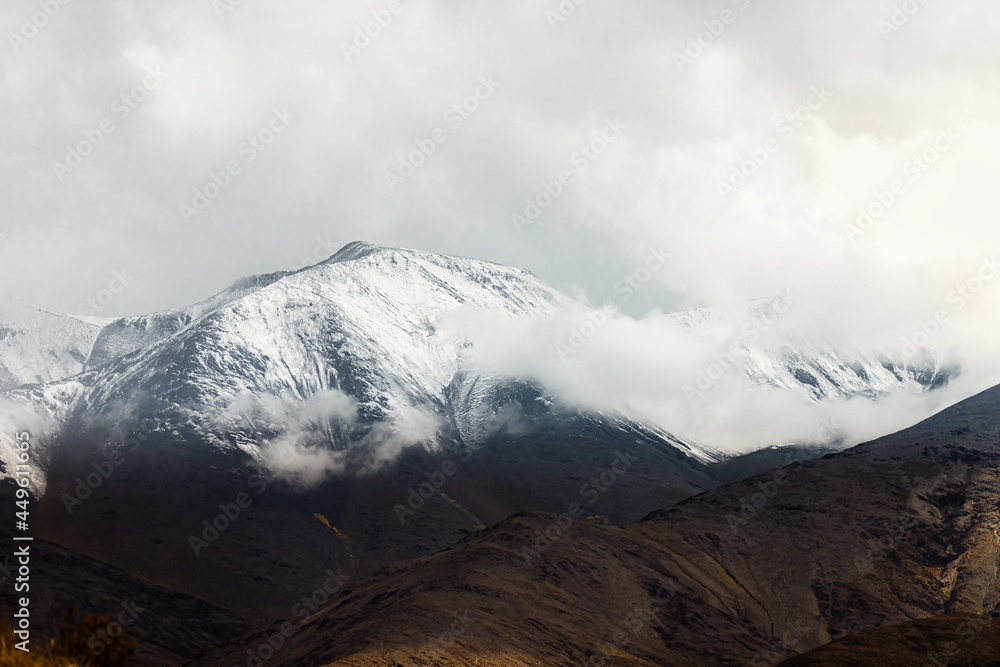 Snowy mountain peak with clouds in Salta, Argentina